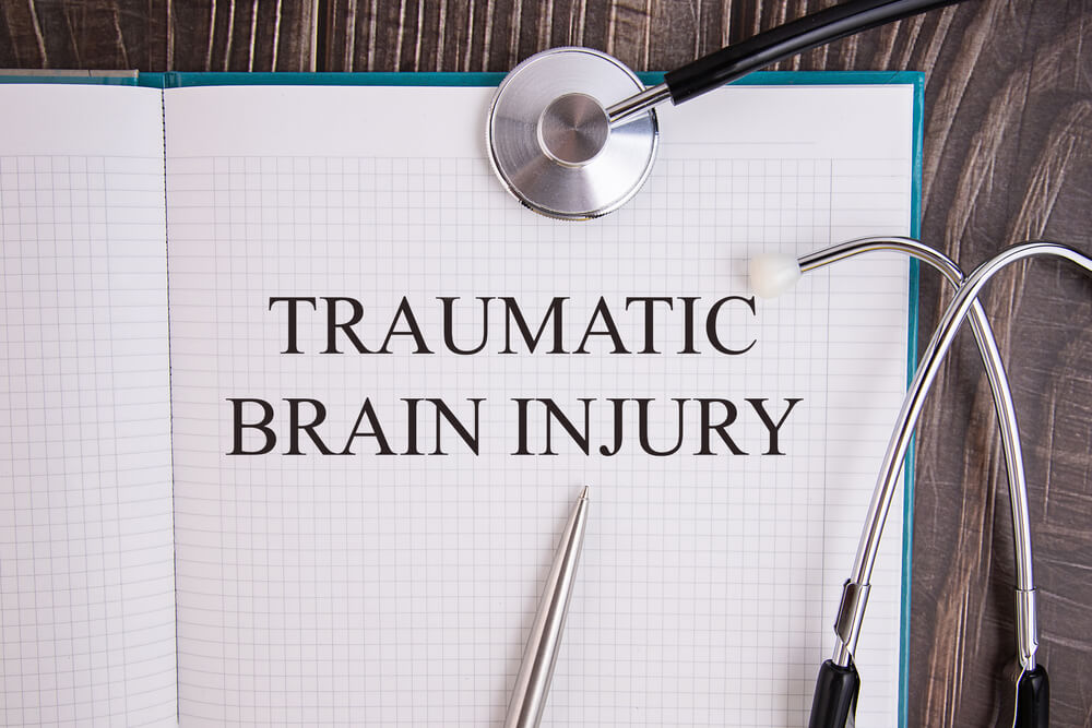 notepad with traumatic brain injury written